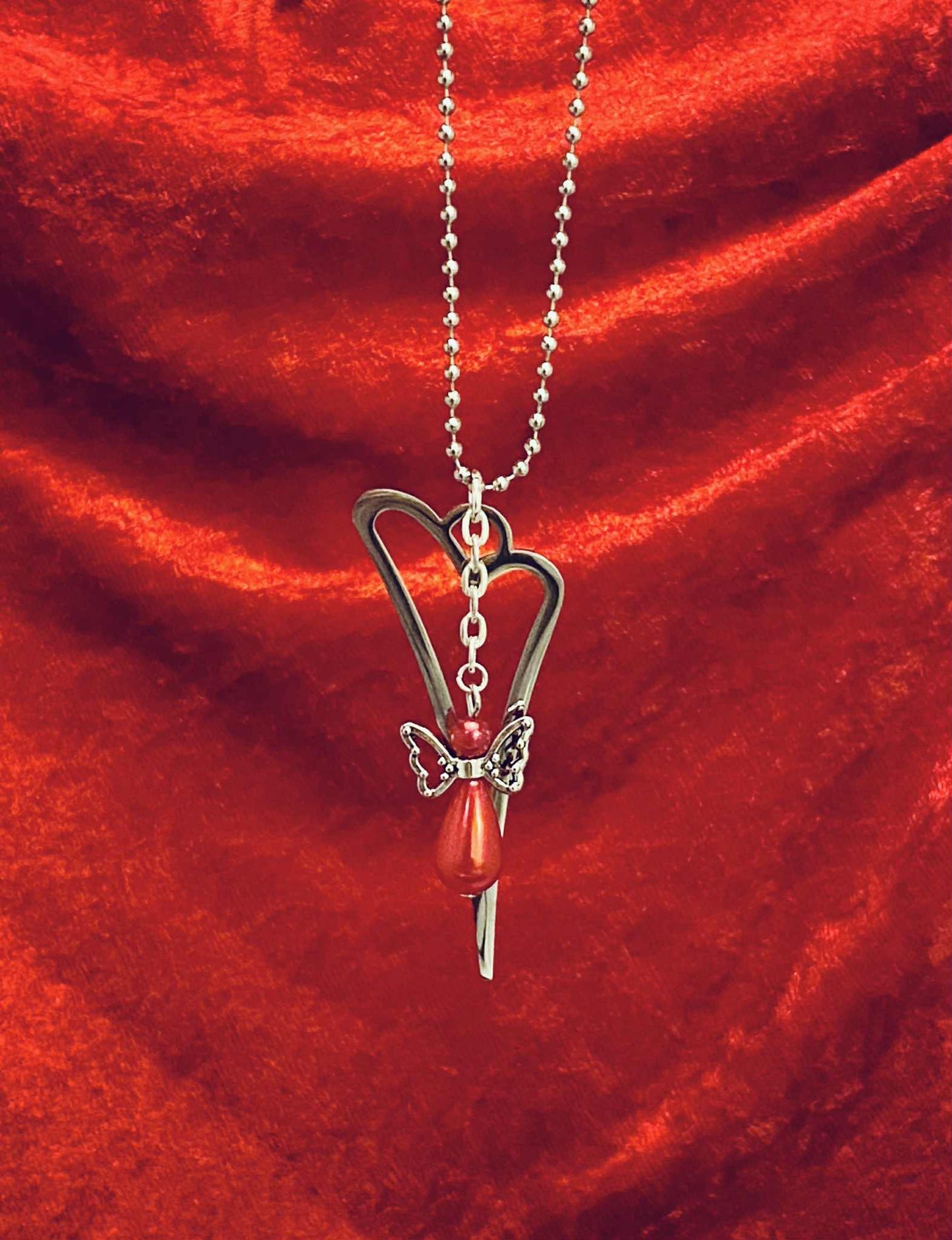 Halssmycke med ängel och hjärta